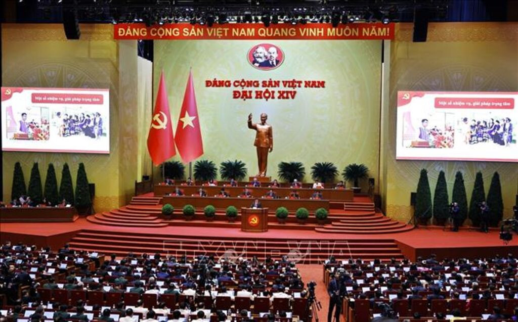 165201-vna_potal_dai_hoi_dang_xiv_tiep_tuc_phien_thao_luan_tai_hoi_truong_ve_cac_van_kien_dai_hoi_stand-5.jpg